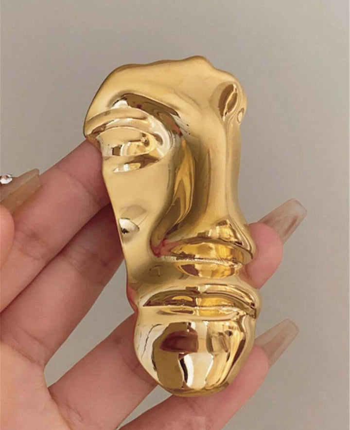 Face Brooch